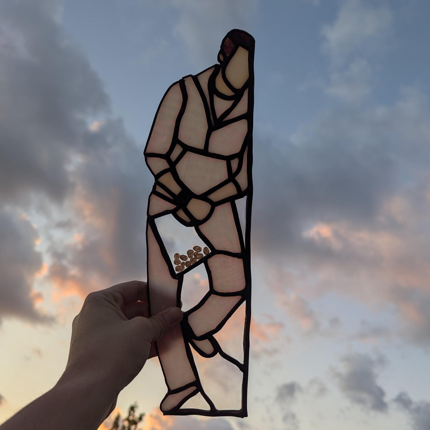 Preorder: Suncatcher of Kellan Lutz holding a bag of eggs