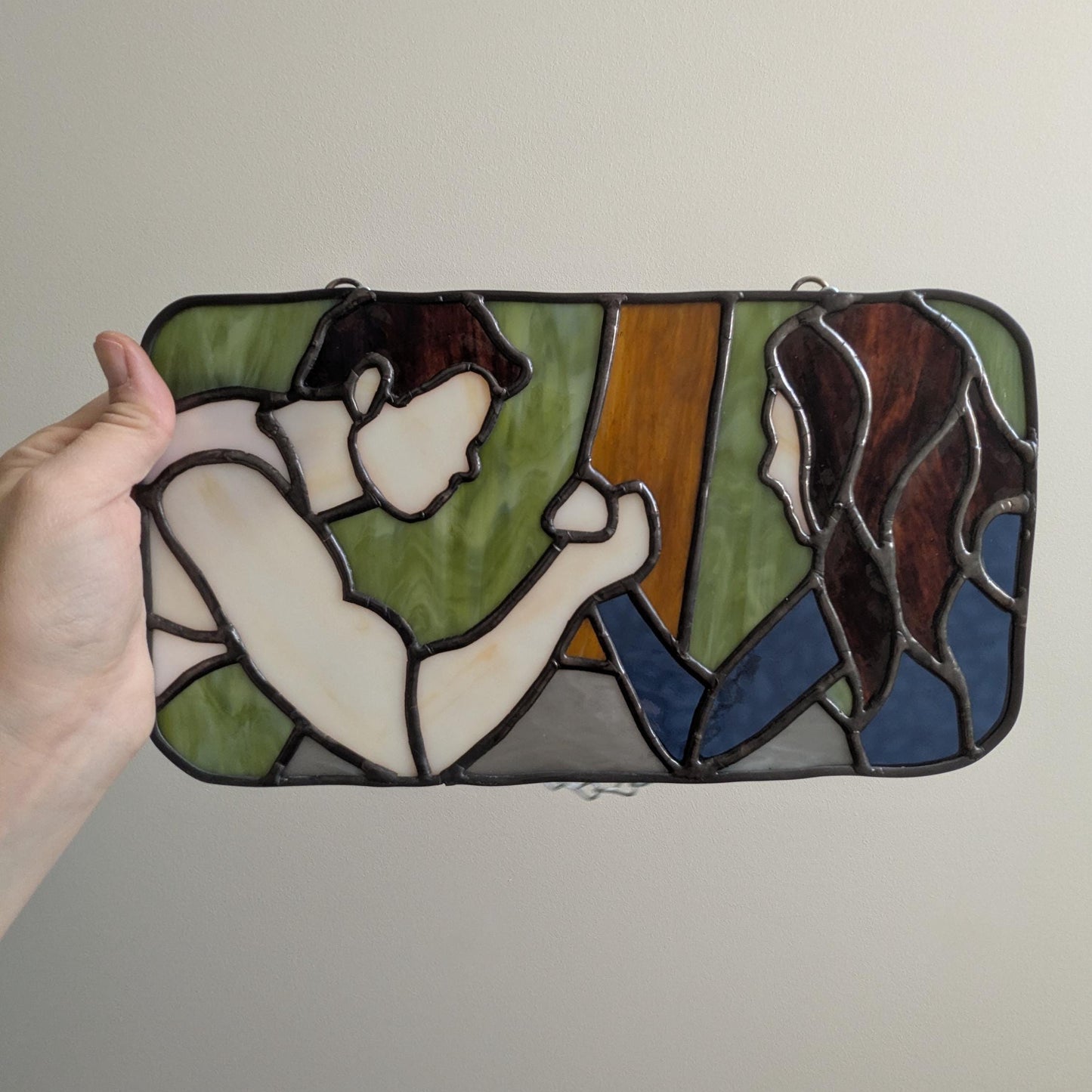 Bella and Emmett Arm Wrestle, A Suncatcher