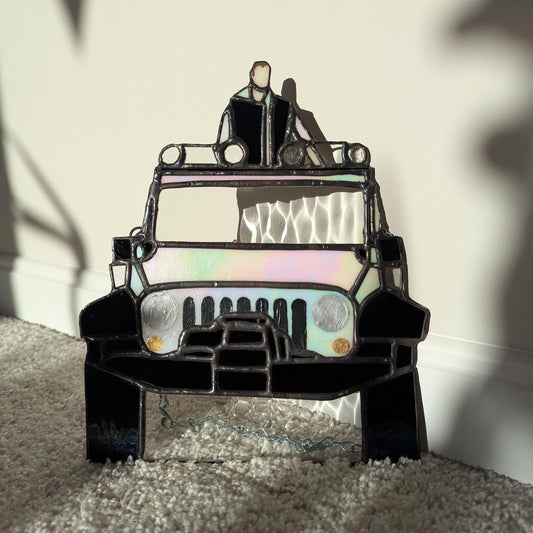 Sun Catcher of Emmett in his Jeep