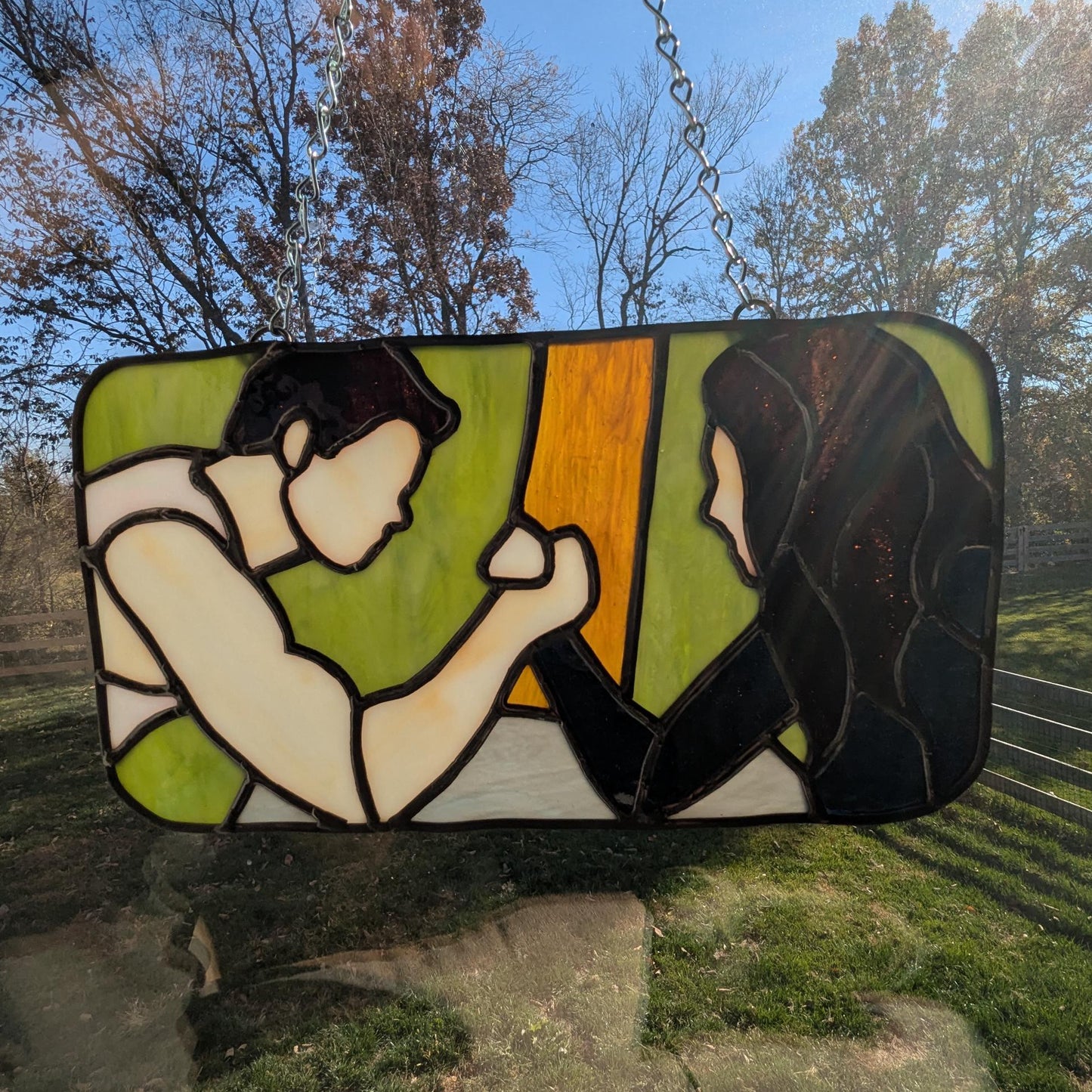 Bella and Emmett Arm Wrestle, A Suncatcher