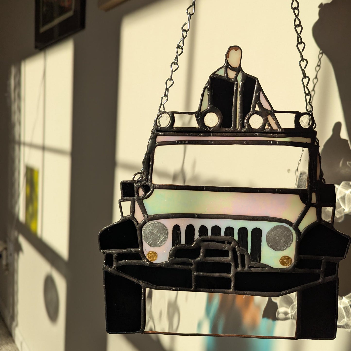 Sun Catcher of Emmett in his Jeep