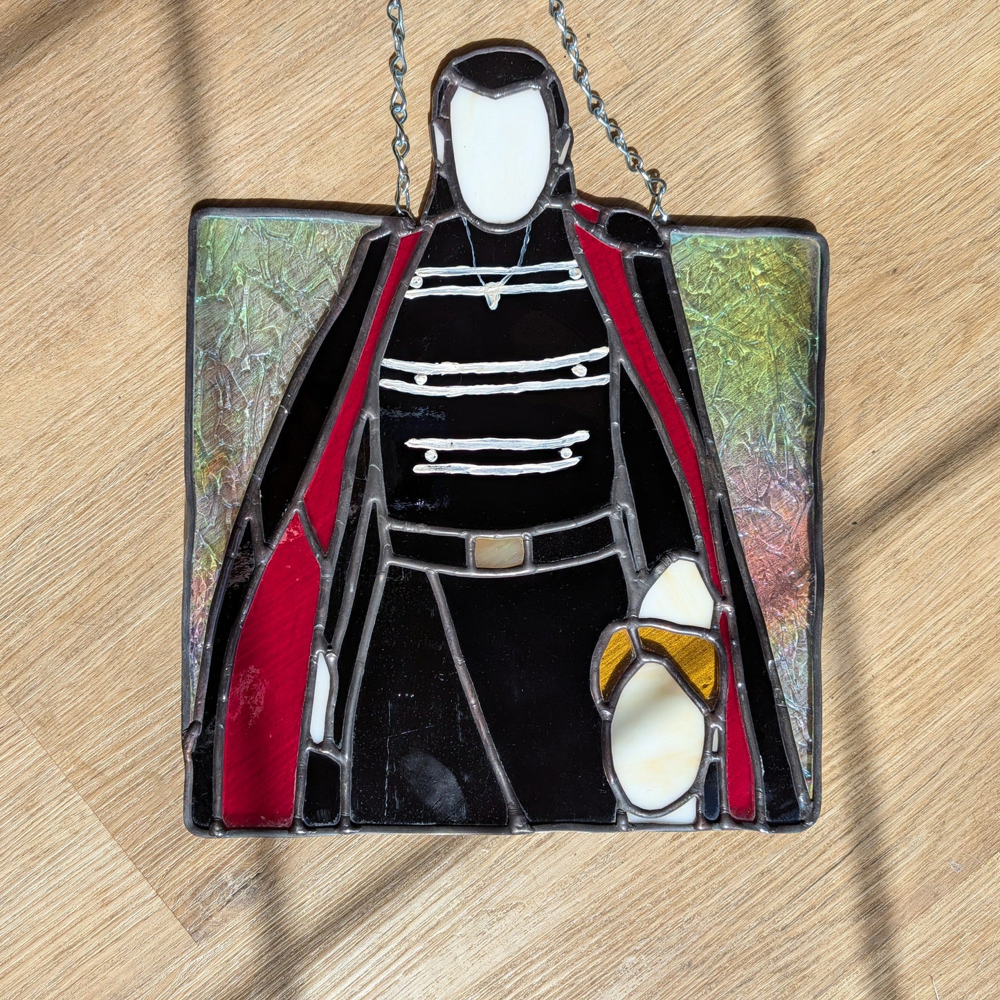 Pre-order: Aro holding Carlisle's head, A Twilight-inspired Sun Catcher